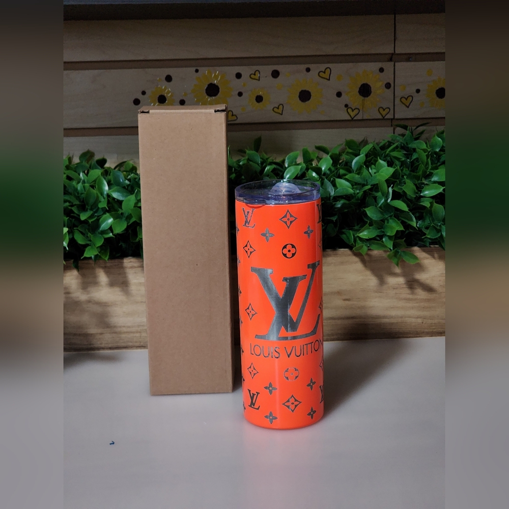 Orange Tumbler With Engraved Design